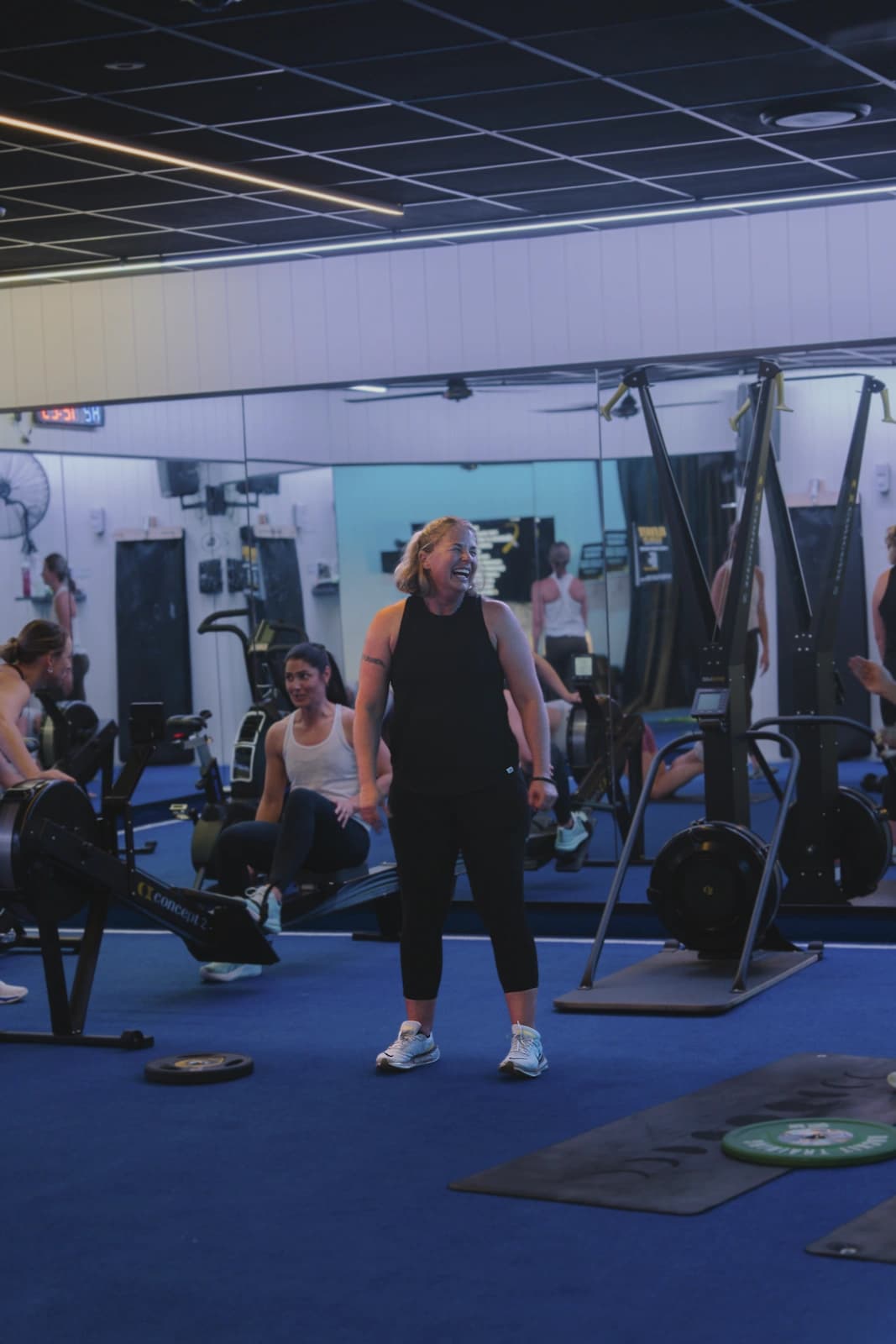 A member laughing during a session at Flex New Plymouth.
